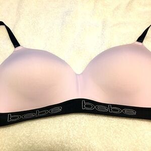 Bebe bra size 34DD. No underwire. Soft and comfy. Lightly padded cups.